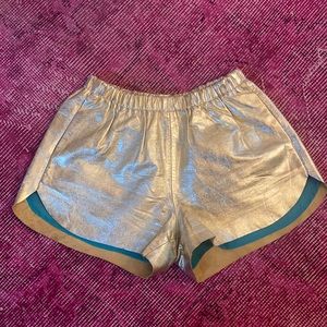 Metallic gold leather shorts with pockets